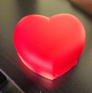 Tupperware Red Heart-Shaped Food Container